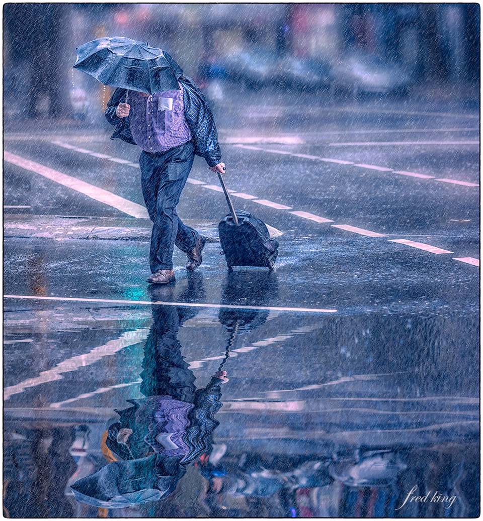 Man in rain plus